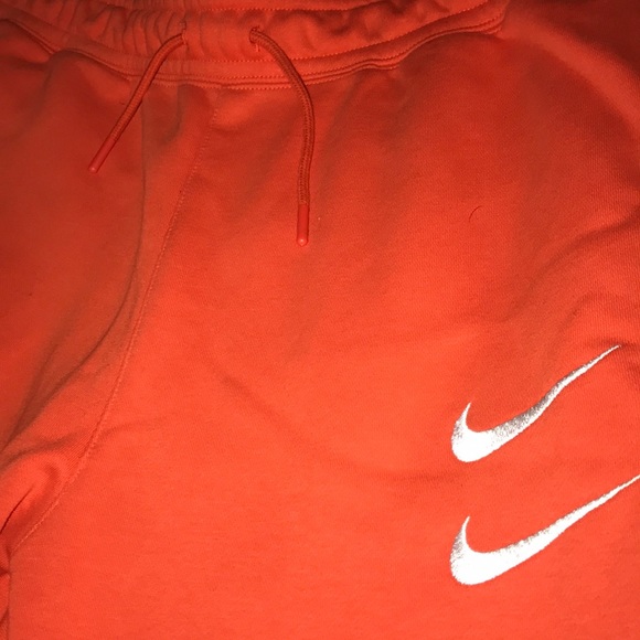 Nike double swoosh joggers orange Clearance